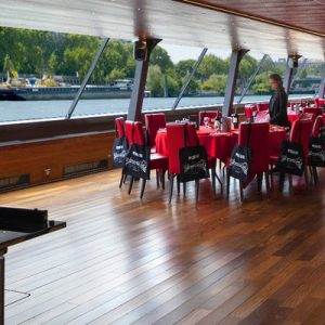 tables inside a cruise boat in Paris