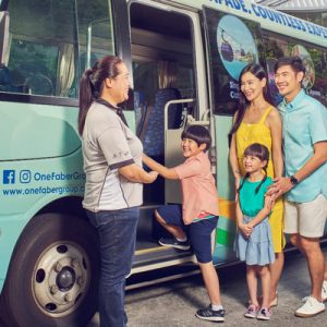 the Sentosa Island tour bus with a family entering it