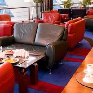 couches and coffee table at dubai international airport lounge