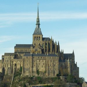 a view of the looming Mont-Saint-Michel Abbey from afar