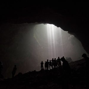 group of tourists in jomblang cave