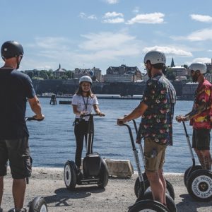 people riding segways with tour guide for the stockholm segway tour