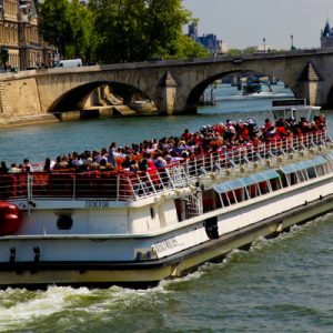 a cruise boat along the Seine River