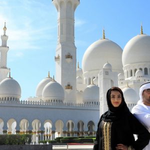 couple standing in grand mosque abu dhabi