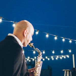 performers playing music on the Casa Batllo roof terrace