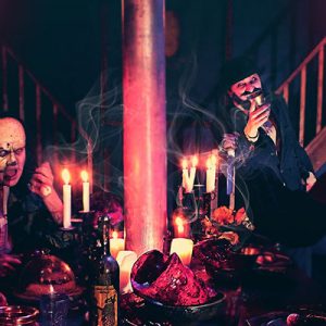 a group of monsters on a dinner table