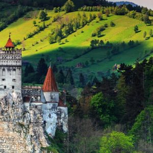 bran castle with mountains, aerial view