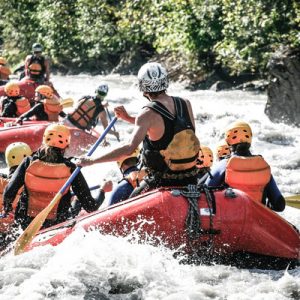 groups of tourists rafting