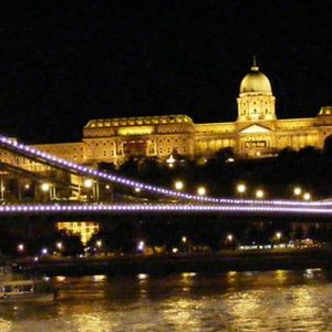 a bridge in Budapest illuminated at night