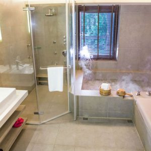 bathroom inside gaia hotel with bathtub